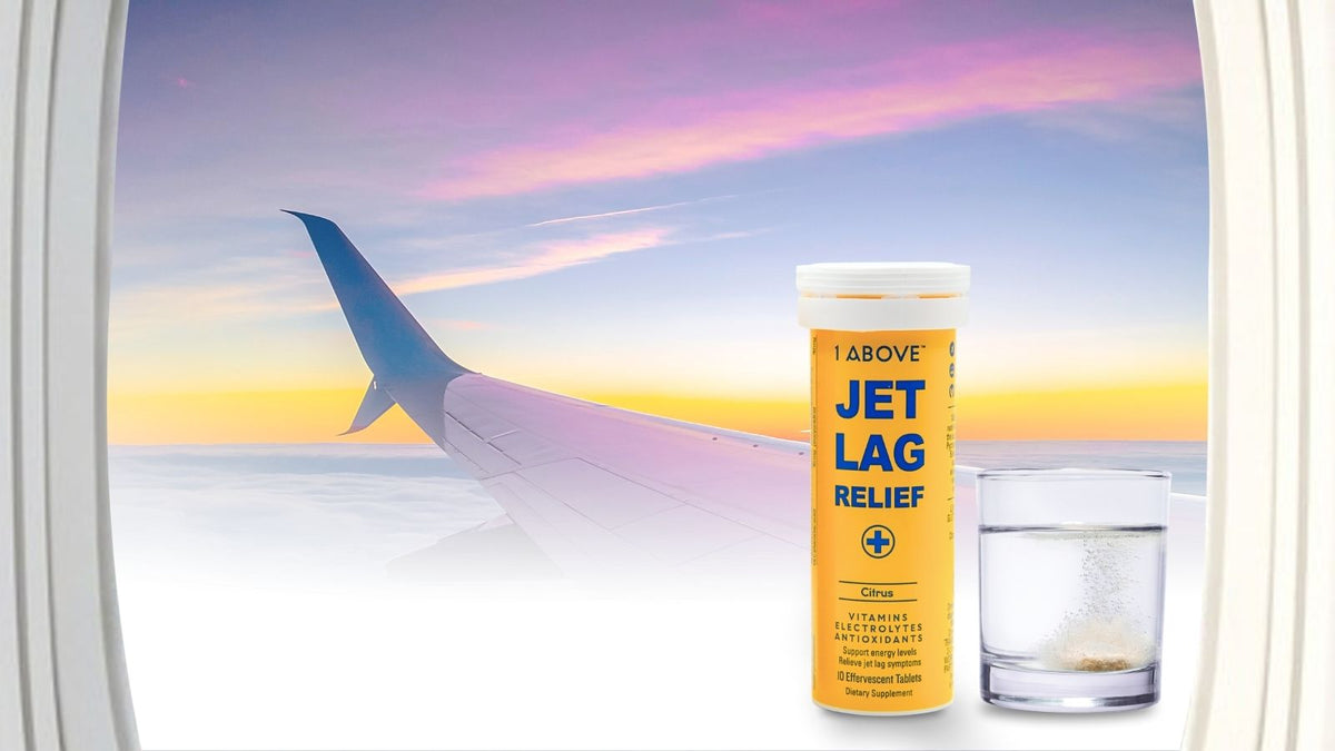 1Above Jet Lag Relief+ beside water looking outside an airplane window toward sunrise